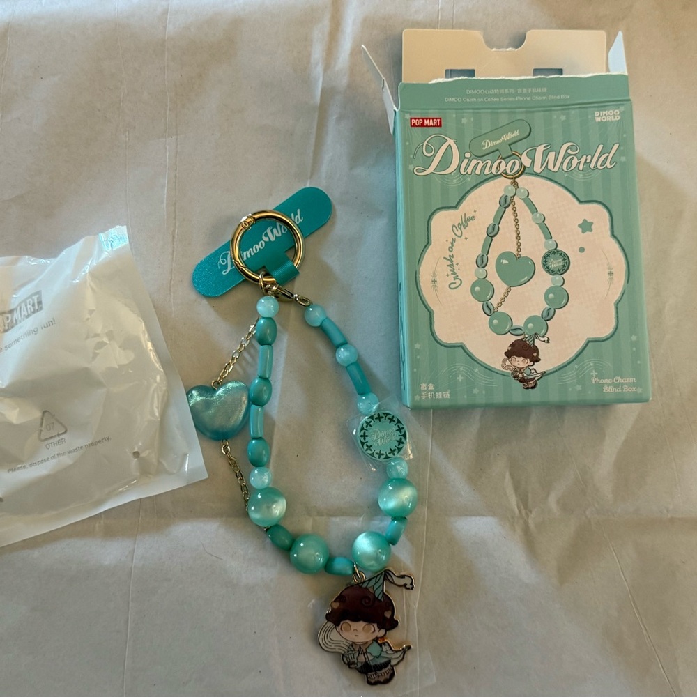 Dimmo phone charm